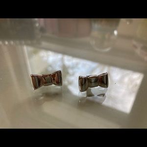 Silver bow stud earrings